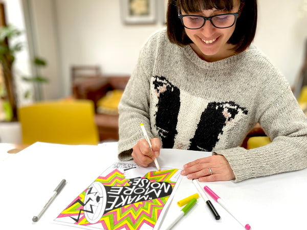 Make More Noise: a colouring book of feminist phrases