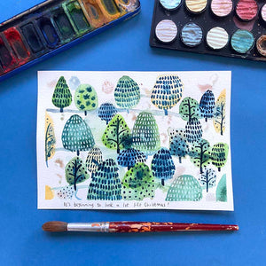 Create a watercolour festive forest