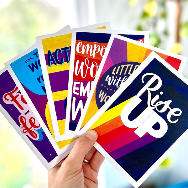 A6 postcard pack of six colourful feminist postcards from the Rise Up collection - recycled card