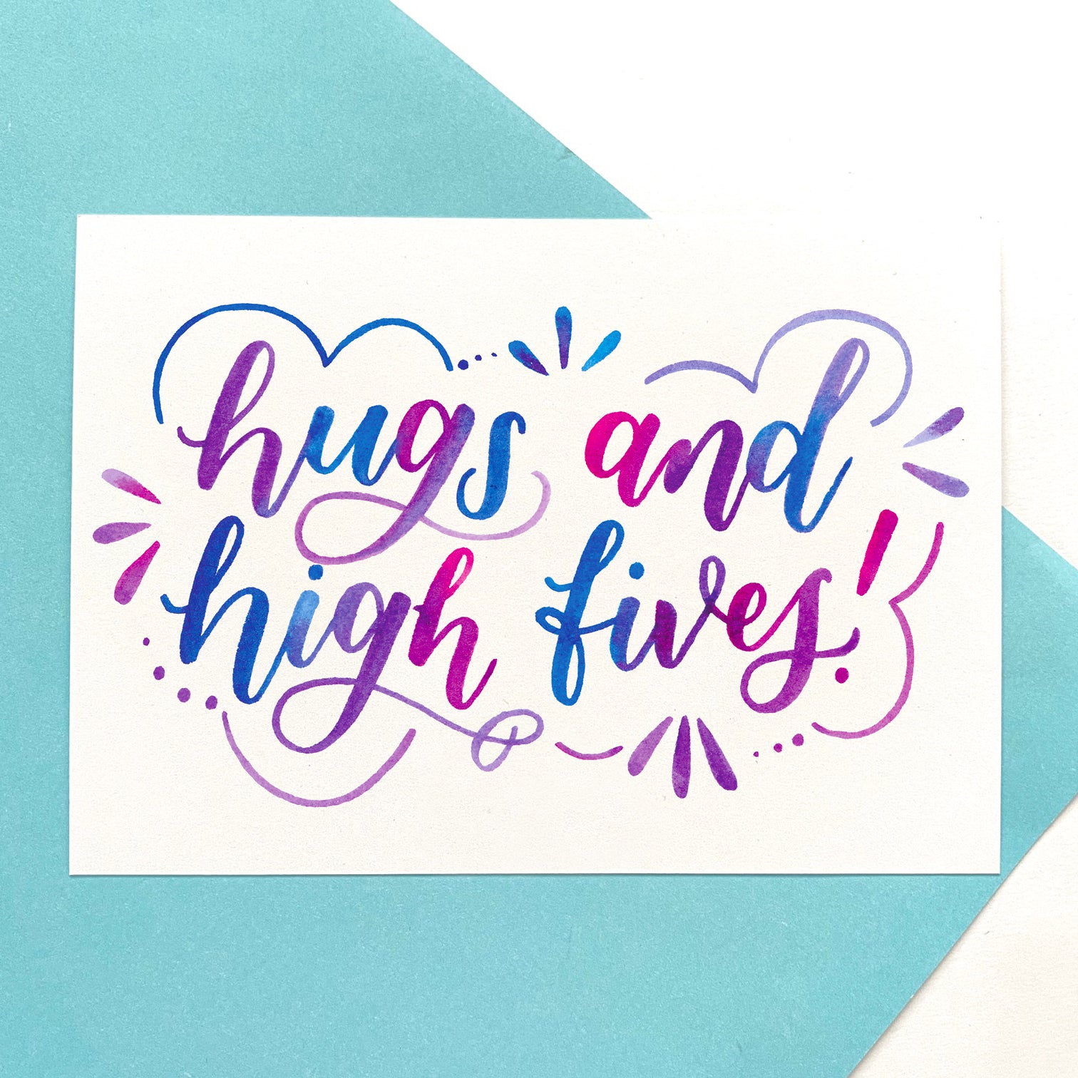 A6 positive postcard: 'Hugs and high fives' - printed on recycled card