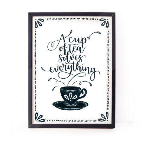 Fun wall art for tea lovers - A cup of tea solves everything